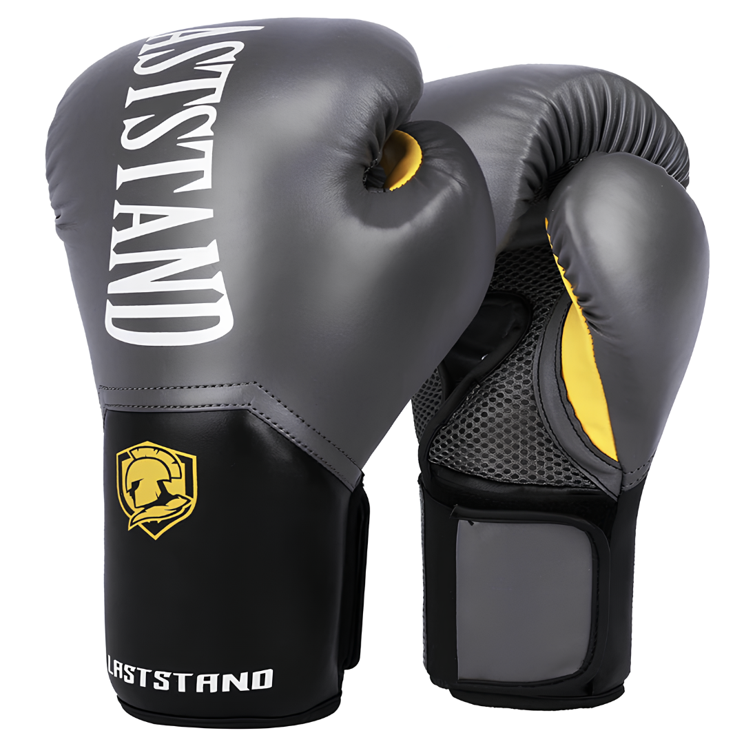 Graue Boxhandschuhe mit gelben Highlights, langlebig und bequem für verschiedene Boxstile.