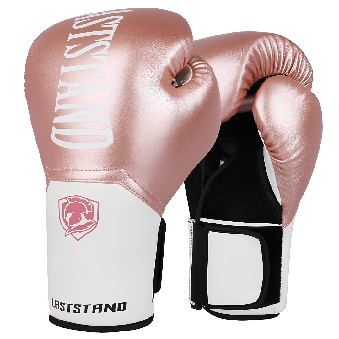 Rosa Boxhandschuhe mit weißen Akzenten, stilvoll und funktional für Frauen und Kinder.